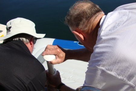 Sucia - Joe & Fred inflating the FM dinghy