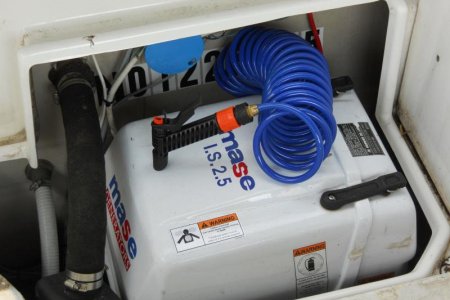 McTug - 10 - hose tucks in under gen. cover