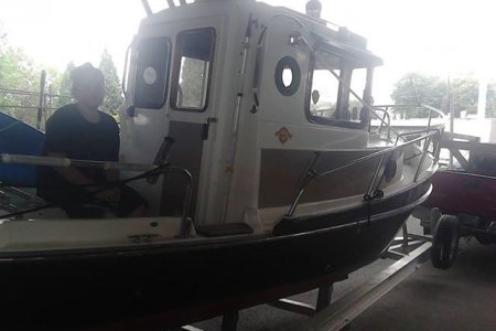 The "unnamed tug" arrives in Portland