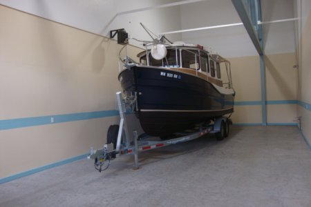 Trailer and tug in our storage unit