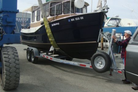 At Cap Sante after bottom paint May 2013. Loading boat onto trailer.