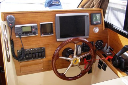 Relocation of vhf radio and vacuum gauge added