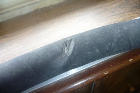 Raw water hose damage poorly routed from new