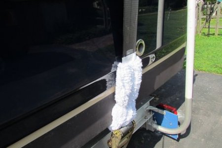 Trailer stuff wash mitts with front cut out to slide over our 4" gunnel strap