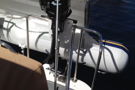 Same SS shaft and fittings were used to brace patio railing where dinghy outboard is stored. End caps were welded on shaft ends.