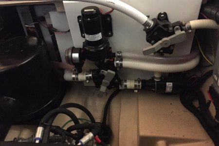 Added Y valve (top valve) for macerator driven pump out to sewer line.
