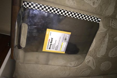 Image of Helmsman's floorboard on foot of bed.