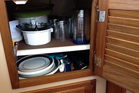 Shelf in galley cabinet