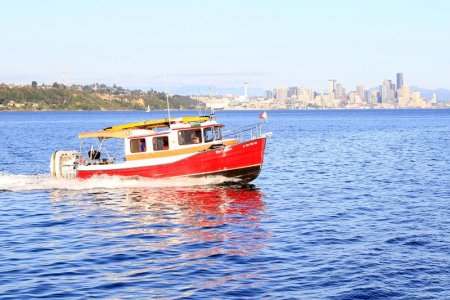 Red Raven at fast cruise in front of downtown Seattle