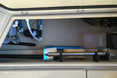 Accumulator and overflow tank