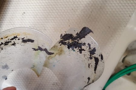 black stuff on shaft cover