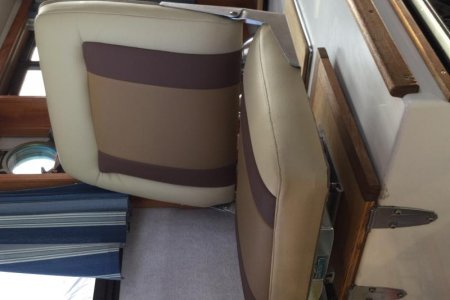 recovered the seat and made it  two inches wider and taller