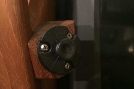 Made a custom angled mount block out of teak to hold the handset at optimum angle for viewing.