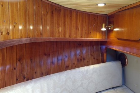 V-berth corner, foam-backed head board.