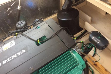 PALI engine heater installed on wood shelf