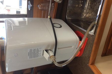 Dehumidifier outlet hose emptying in sink
