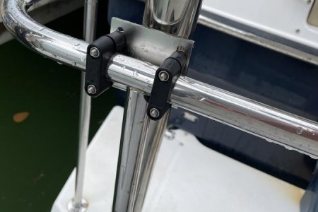 Mast bracket on rail, straddling Ranger rail joint for security