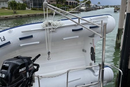Block and tackle in motor transit position, thru the swim platform chain