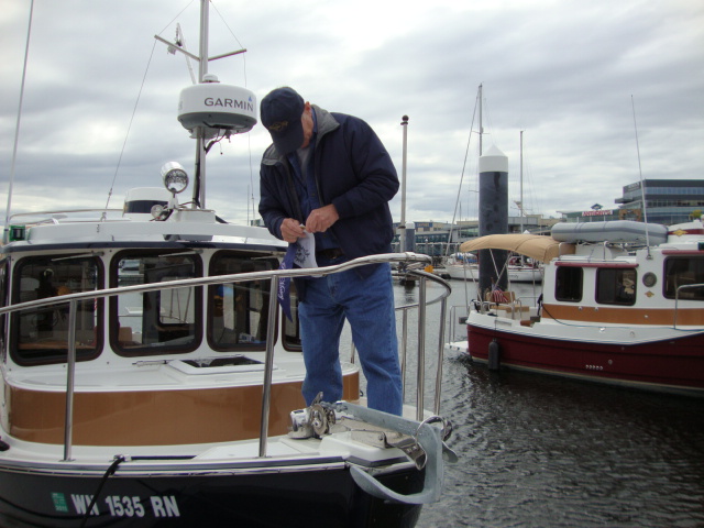 9-10 Bremerton Joe attaches the R-MATEY burgee