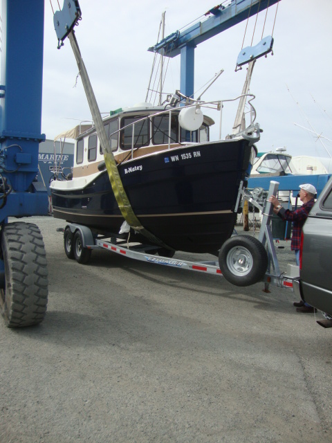 At Cap Sante after bottom paint May 2013. Loading boat onto trailer.