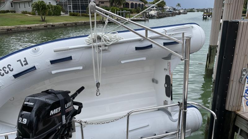 Block and tackle in motor transit position, thru the swim platform chain