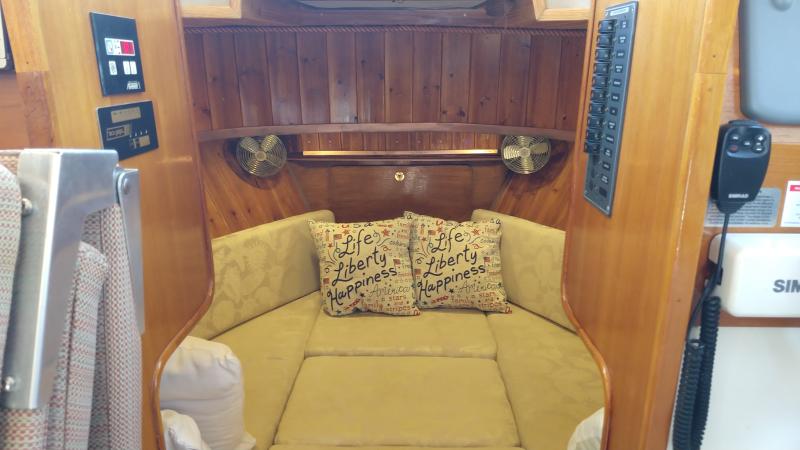 Cabinet at foot of v-berth and new fans throughout