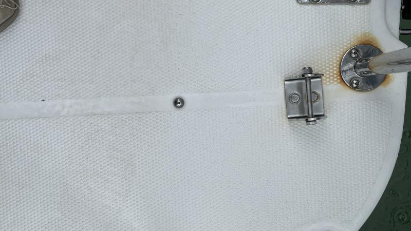 Crane base bracket thru bolted to swim platform and the SS swim platform bracket underneath
