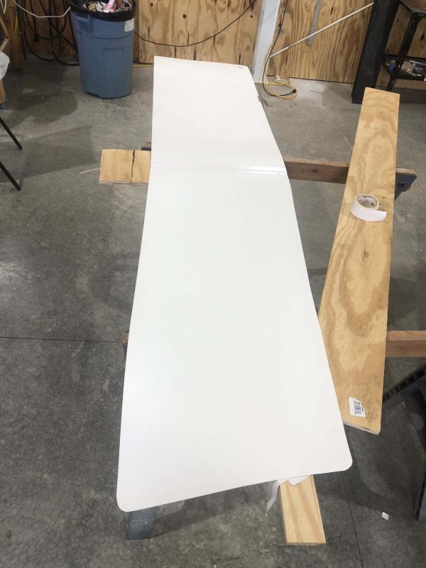 Cut Plastic in two pieces and taped together