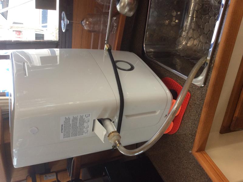 Dehumidifier outlet hose emptying in sink