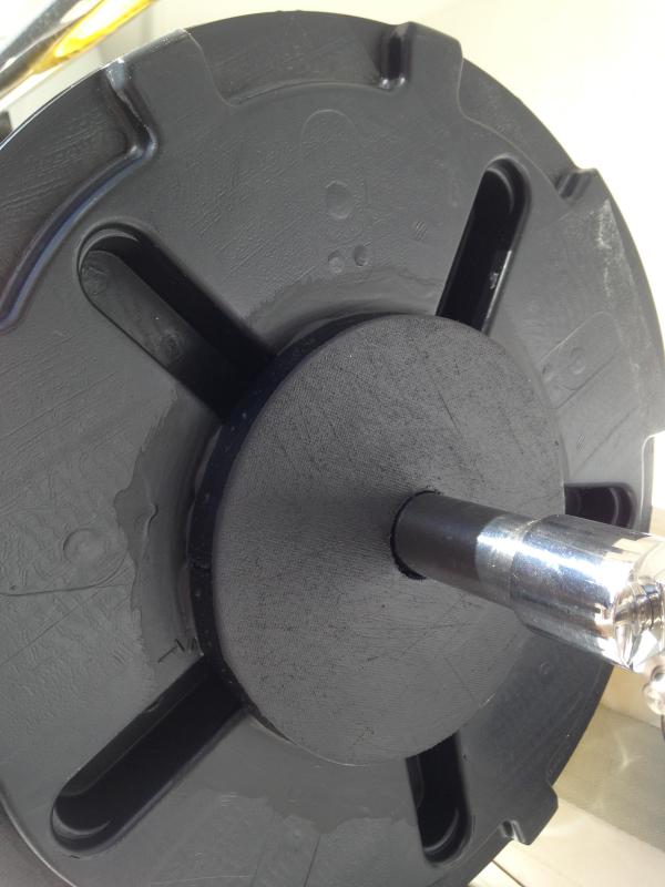 Homemade flange/adapter JB Welded on plastic spool.