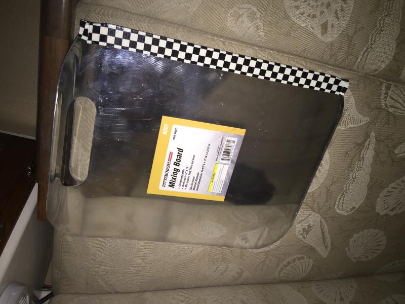 Image of Helmsman's floorboard on foot of bed.
