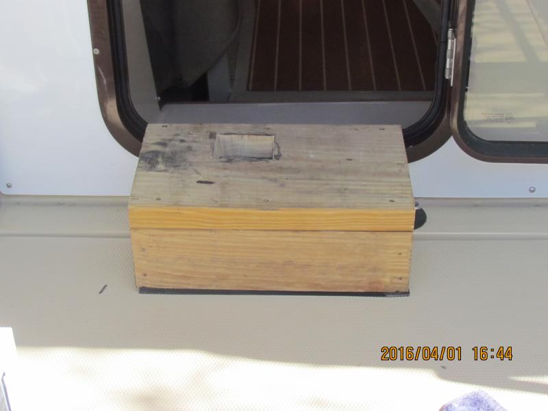 Land based AC box in position cut out for consensate to drain into the cockpit and exit via scuppers