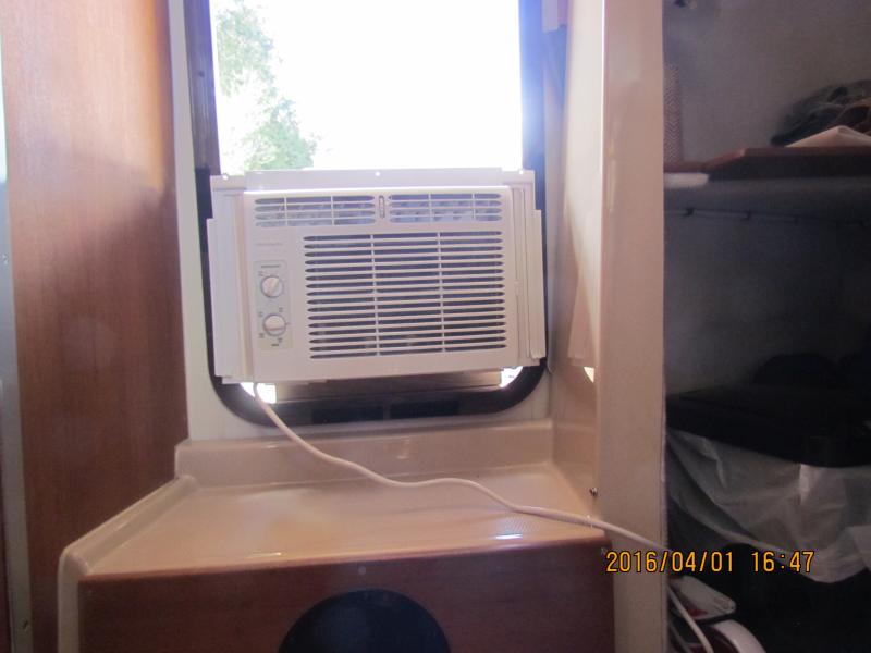 Land Based AC Unit where it rest in the doorway. We will use a velcroed cover and some foam to close off th gaps
