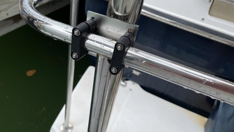 Mast bracket on rail, straddling Ranger rail joint for security