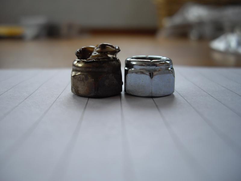 Melted nut on left and new nut on right