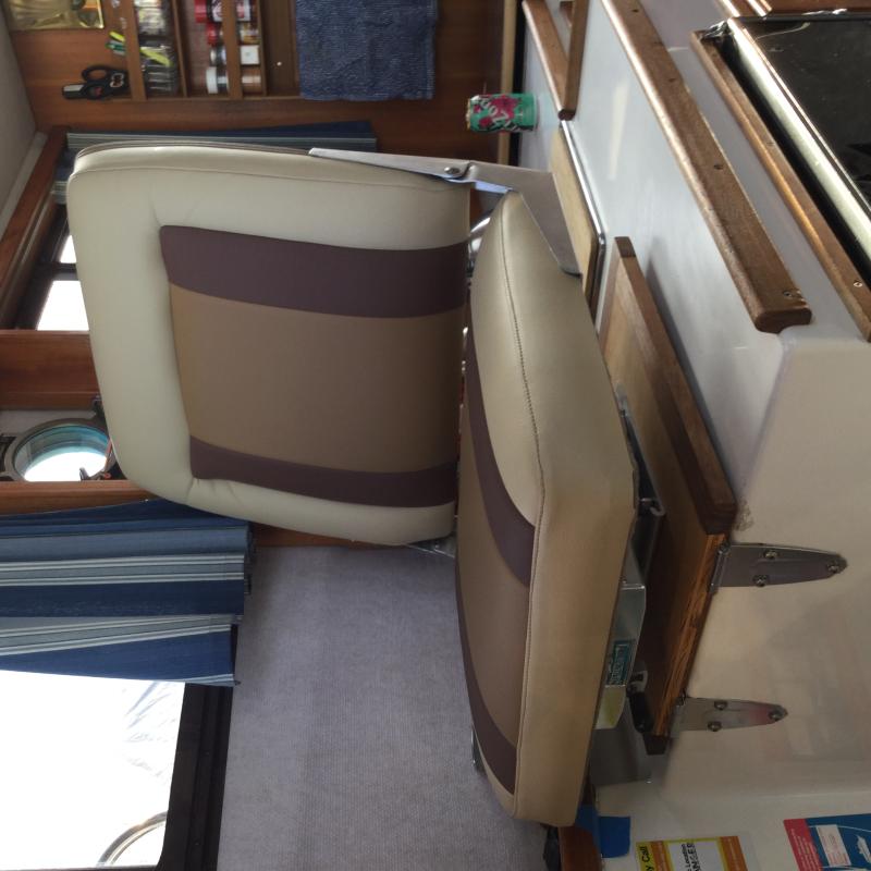 recovered the seat and made it  two inches wider and taller