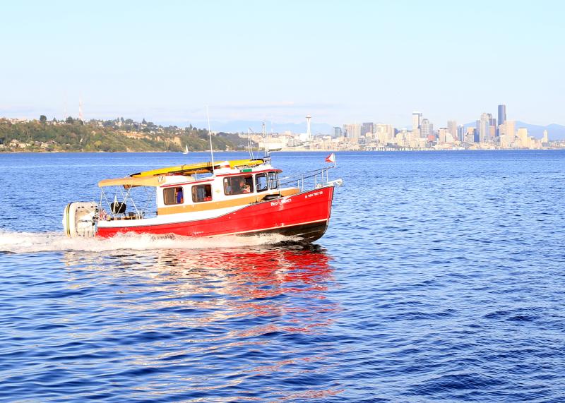 Red Raven at fast cruise in front of downtown Seattle