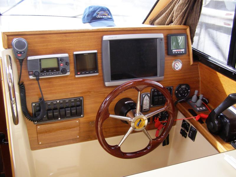 Relocation of vhf radio and vacuum gauge added
