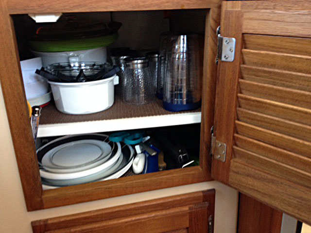 Shelf in galley cabinet